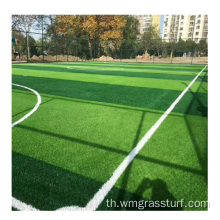 หญ้าสังเคราะห์สีเขียวและสนามหญ้าเทียมฟุตบอล
